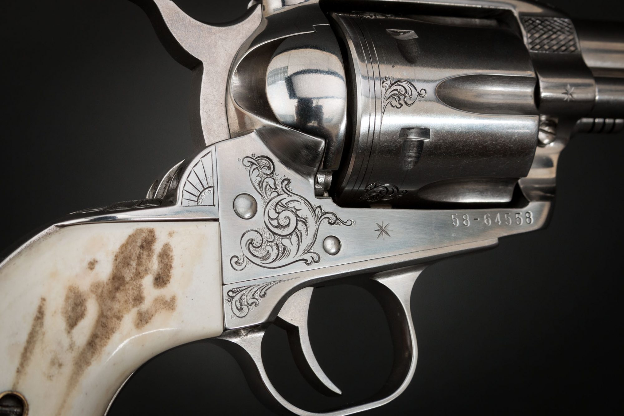 Stainless Ruger Vaquero engraved by Heidi Roos