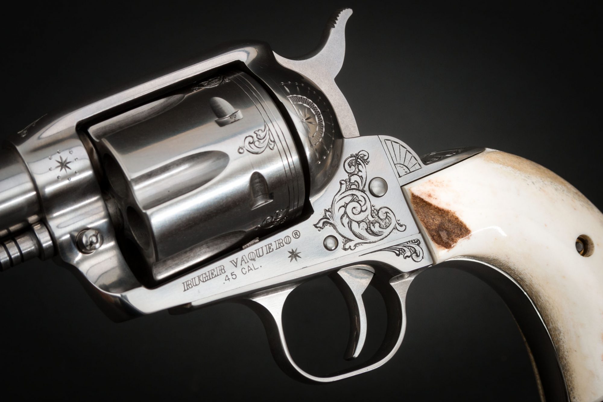 Stainless Ruger Vaquero engraved by Heidi Roos