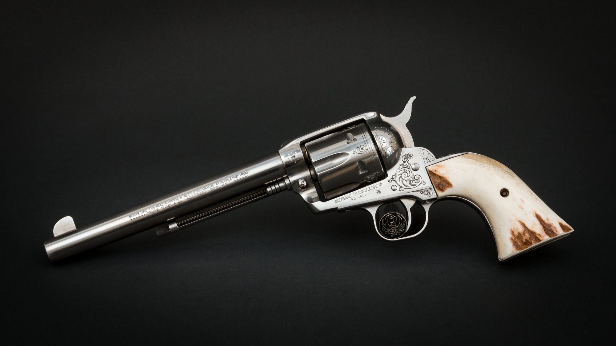 Stainless Ruger Vaquero engraved by Heidi Roos