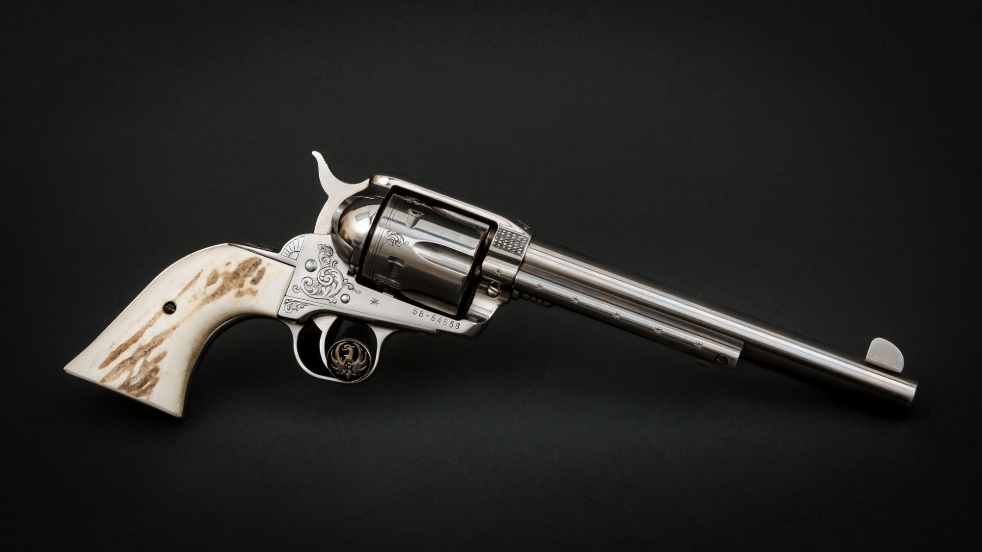 Stainless Ruger Vaquero engraved by Heidi Roos